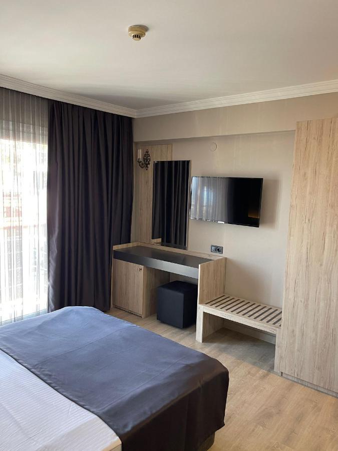 Grand Faik Hotel Кешме Экстерьер фото