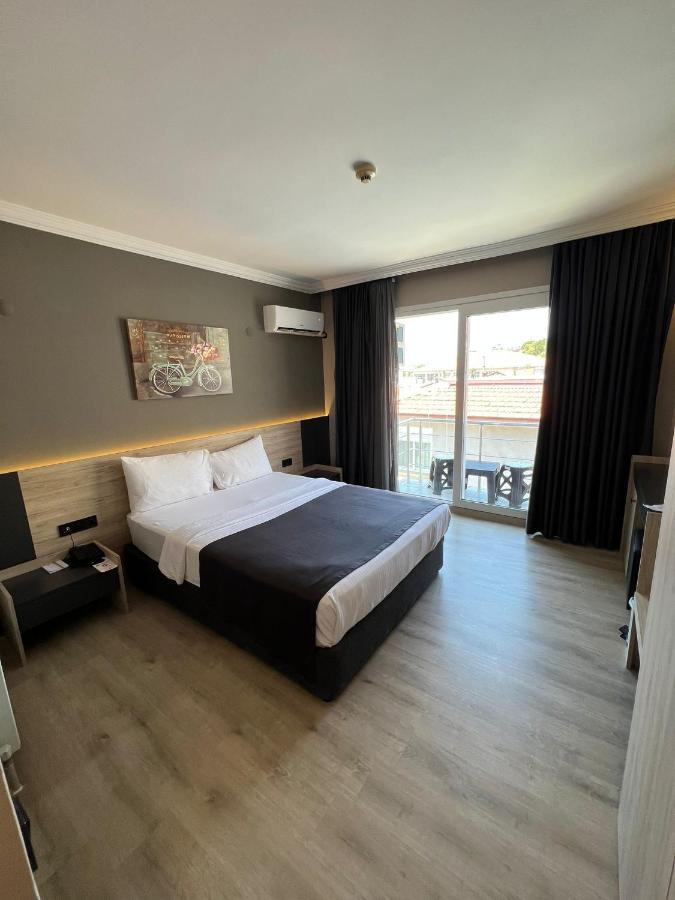 Grand Faik Hotel Кешме Экстерьер фото