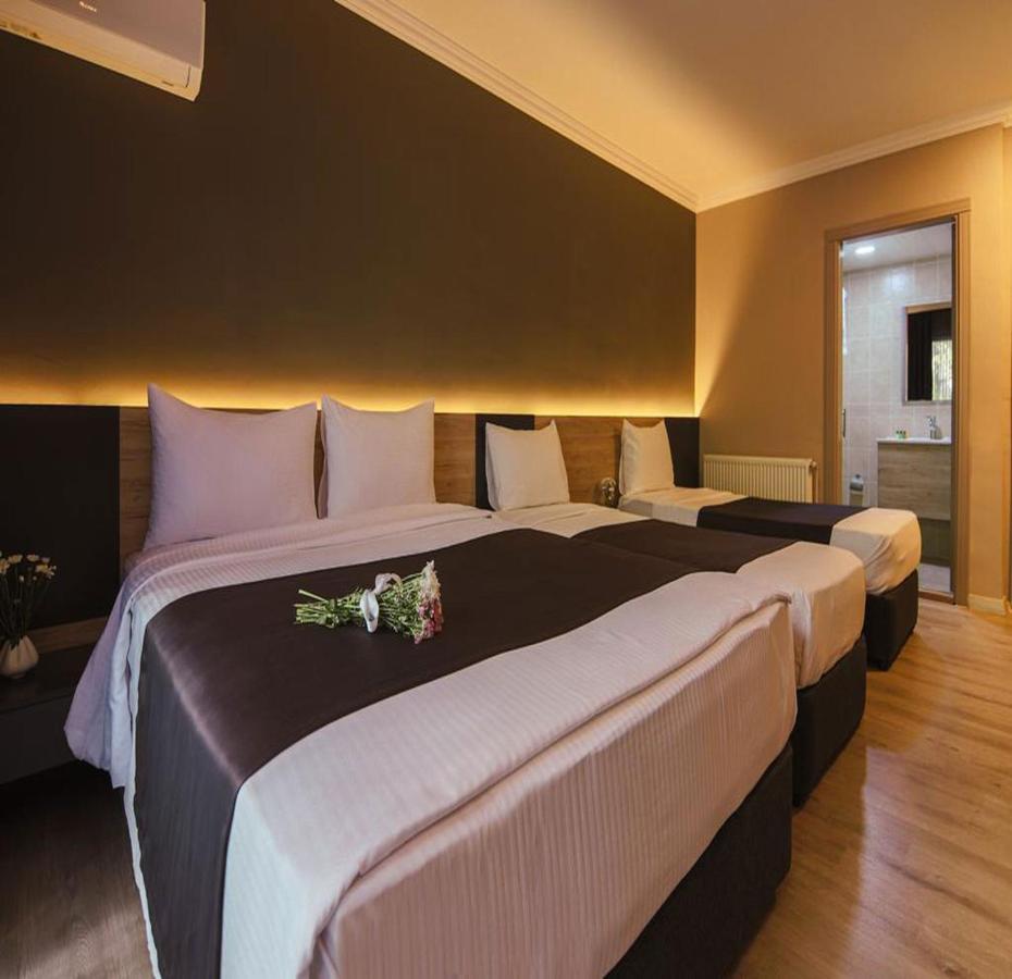 Grand Faik Hotel Кешме Экстерьер фото