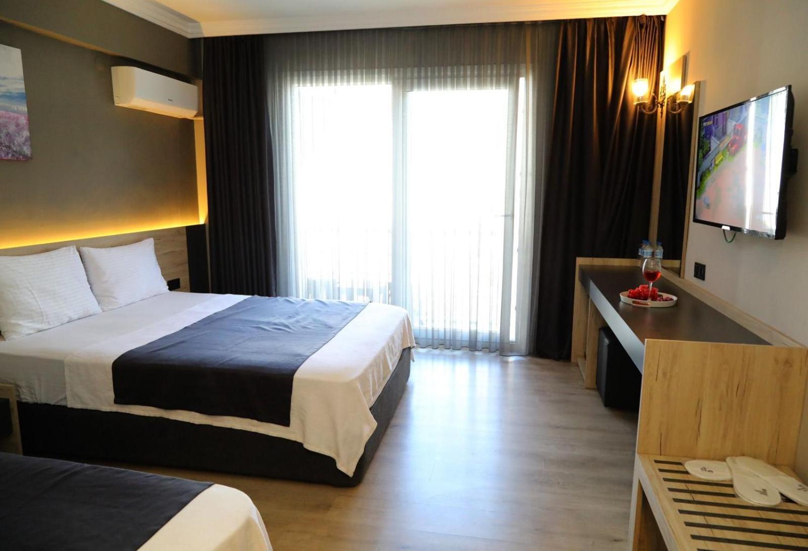 Grand Faik Hotel Кешме Экстерьер фото