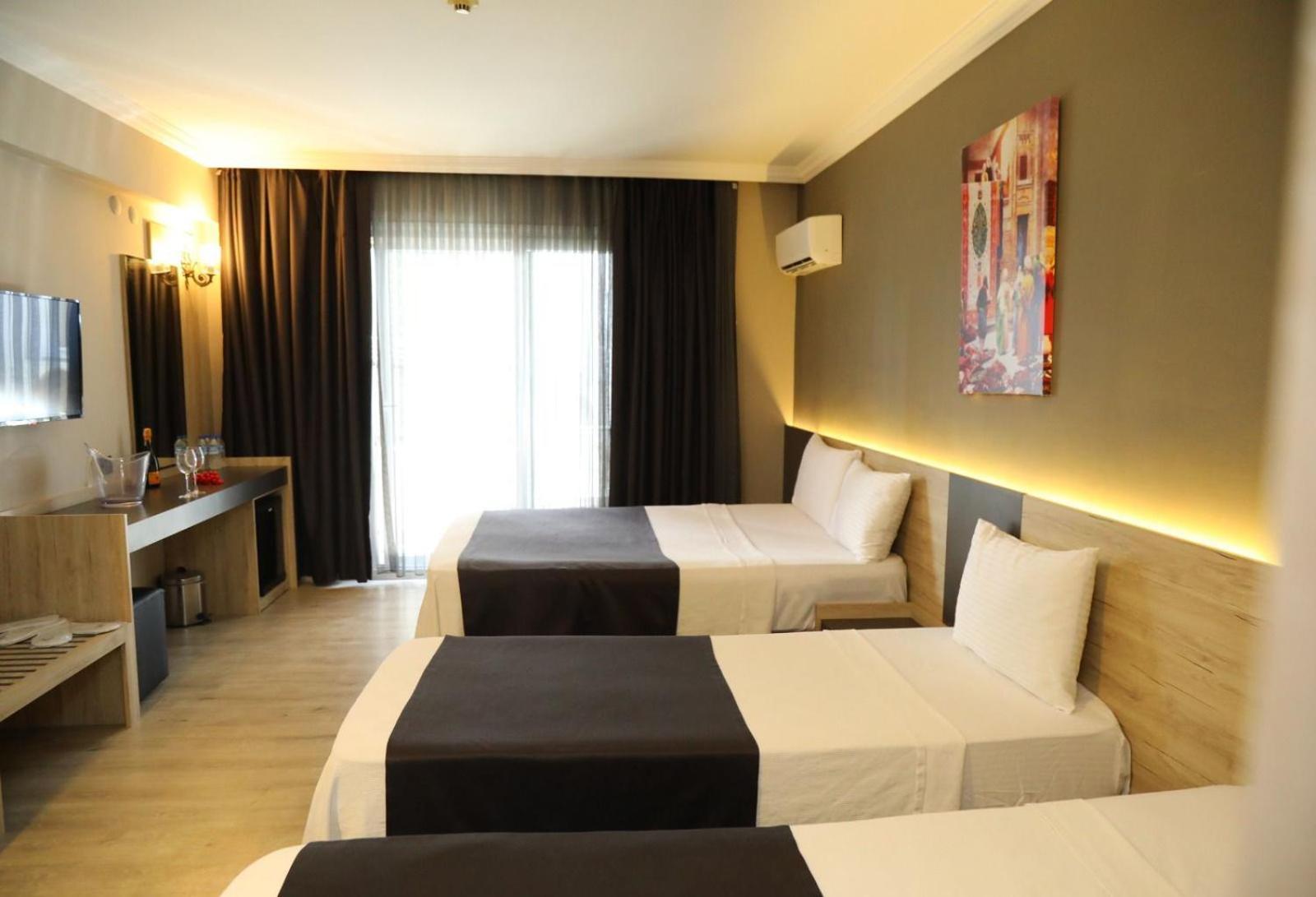 Grand Faik Hotel Кешме Экстерьер фото